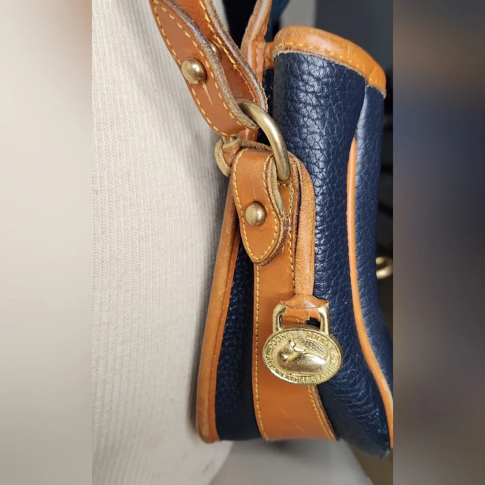 Dooney & Bourke vintage equestrian all weather leather crossbody bag, navy